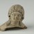 Coptic. <em>Female Head</em>, 5th-6th century C.E. Clay, pigment, 2 7/16 x 2 11/16 x 1 13/16 in. (6.2 x 6.8 x 4.6 cm). Brooklyn Museum, Gift of Evangeline Wilbour Blashfield, Theodora Wilbour, and Victor Wilbour honoring the wishes of their mother, Charlotte Beebe Wilbour, as a memorial to their father, Charles Edwin Wilbour, 16.232. Creative Commons-BY (Photo: Brooklyn Museum (in collaboration with Index of Christian Art, Princeton University), CUR.16.232_view1_ICA.jpg)