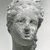 Greek. <em>Female Head</em>, 170 B.C.E.-100 C.E. Clay, pigment, 2 7/16 x 1 7/16 x 1 1/2 in. (6.2 x 3.6 x 3.8 cm). Brooklyn Museum, Gift of Evangeline Wilbour Blashfield, Theodora Wilbour, and Victor Wilbour honoring the wishes of their mother, Charlotte Beebe Wilbour, as a memorial to their father, Charles Edwin Wilbour, 16.317. Creative Commons-BY (Photo: Brooklyn Museum, CUR.16.317_NegA_print_bw.jpg)