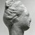 Greek. <em>Female Head</em>, 170 B.C.E.-100 C.E. Clay, pigment, 2 7/16 x 1 7/16 x 1 1/2 in. (6.2 x 3.6 x 3.8 cm). Brooklyn Museum, Gift of Evangeline Wilbour Blashfield, Theodora Wilbour, and Victor Wilbour honoring the wishes of their mother, Charlotte Beebe Wilbour, as a memorial to their father, Charles Edwin Wilbour, 16.317. Creative Commons-BY (Photo: Brooklyn Museum, CUR.16.317_NegB_print_bw.jpg)
