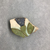  <em>Fragment of a Tile</em>, ca. 1352-1332 B.C.E. Faience, 1 5/16 × 3/8 × 2 1/16 in. (3.4 × 1 × 5.2 cm). Brooklyn Museum, Gift of Evangeline Wilbour Blashfield, Theodora Wilbour, and Victor Wilbour honoring the wishes of their mother, Charlotte Beebe Wilbour, as a memorial to their father, Charles Edwin Wilbour, 16.333. Creative Commons-BY (Photo: , CUR.16.333_view01.jpg)