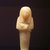  <em>Shabty of Nofer</em>, ca. 1352-1279 B.C.E. Egyptian alabaster (calcite), 4 5/8 x width at elbows 1 5/8 in. (11.8 x 4.2 cm). Brooklyn Museum, Gift of Evangeline Wilbour Blashfield, Theodora Wilbour, and Victor Wilbour honoring the wishes of their mother, Charlotte Beebe Wilbour, as a memorial to their father, Charles Edwin Wilbour, 16.377. Creative Commons-BY (Photo: Brooklyn Museum, CUR.16.377_mummychamber.jpg)