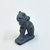  <em>Amulet of Bastet, in the Form of a Cat with Kitten</em>. Glass, 11/16 × 1 5/8 in. (1.7 × 4.2 cm). Brooklyn Museum, Gift of Evangeline Wilbour Blashfield, Theodora Wilbour, and Victor Wilbour honoring the wishes of their mother, Charlotte Beebe Wilbour, as a memorial to their father, Charles Edwin Wilbour, 16.580.102. Creative Commons-BY (Photo: Brooklyn Museum, CUR.16.580.102_view2.jpg)
