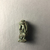  <em>Seated Monkey as Amulet</em>, 30-395 C.E. Faience, 1 5/16 × 9/16 × 9/16 in. (3.4 × 1.4 × 1.5 cm). Brooklyn Museum, Gift of Evangeline Wilbour Blashfield, Theodora Wilbour, and Victor Wilbour honoring the wishes of their mother, Charlotte Beebe Wilbour, as a memorial to their father Charles Edwin Wilbour, 16.580.43. Creative Commons-BY (Photo: , CUR.16.580.43_view04.jpg)