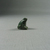  <em>Figure of a Seated Frog as Amulet</em>. Feldspar (?), 9/16 x 3/8 x 1/2 in. (1.4 x 0.9 x 1.3 cm). Brooklyn Museum, Gift of Evangeline Wilbour Blashfield, Theodora Wilbour, and Victor Wilbour honoring the wishes of their mother, Charlotte Beebe Wilbour, as a memorial to their father Charles Edwin Wilbour, 16.580.64. Creative Commons-BY (Photo: Brooklyn Museum, CUR.16.580.64_overall.jpg)