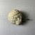 Graeco-Egyptian. <em>Head of the Child Horus</em>. Marble, 1 3/4 × 1 7/16 × 1 3/4 in. (4.5 × 3.7 × 4.5 cm). Brooklyn Museum, Gift of Evangeline Wilbour Blashfield, Theodora Wilbour, and Victor Wilbour honoring the wishes of their mother, Charlotte Beebe Wilbour, as a memorial to their father, Charles Edwin Wilbour, 16.580.83. Creative Commons-BY (Photo: Brooklyn Museum, CUR.16.580.83_view04.jpg)