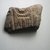  <em>Relief Fragment with Inscription</em>, ca. 1352–1336 B.C.E. Quartzite, 3 1/16 x 4 5/16 in. (7.7 x 11 cm). Brooklyn Museum, Gift of Evangeline Wilbour Blashfield, Theodora Wilbour, and Victor Wilbour honoring the wishes of their mother, Charlotte Beebe Wilbour, as a memorial to their father, Charles Edwin Wilbour, 16.699. Creative Commons-BY (Photo: Brooklyn Museum, CUR.16.699_view01.jpg)