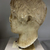 Roman. <em>Head, Apollo of the Omphalos</em>, 1st century C.E. copy of a 480 B.C.E. original. Marble, 12 5/8 × 7 7/8 × 9 1/16 in. (32 × 20 × 23 cm). Brooklyn Museum, Purchased with funds given by A. Augustus Healy and Robert B. Woodward Memorial Fund, 18.166. Creative Commons-BY (Photo: Brooklyn Museum, CUR.18.166_view03.jpg)