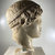 Roman. <em>Head, Apollo of the Omphalos</em>, 1st century C.E. copy of a 480 B.C.E. original. Marble, 12 5/8 × 7 7/8 × 9 1/16 in. (32 × 20 × 23 cm). Brooklyn Museum, Purchased with funds given by A. Augustus Healy and Robert B. Woodward Memorial Fund, 18.166. Creative Commons-BY (Photo: Brooklyn Museum, CUR.18.166_view05-1.jpg)