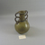 Roman. <em>Bottle</em>, ca. 4th century C.E. Glass, 4 1/2 x greatest diam. 3 1/8 in. (11.5 x 7.9 cm). Brooklyn Museum, Robert B. Woodward Memorial Fund, 19.13. Creative Commons-BY (Photo: Brooklyn Museum, CUR.19.13_view1.jpg)