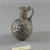 Roman. <em>Bulbous Bottle with Band of Lozenges</em>, second half 1st century C.E. (probably). Glass, 3 1/16 x Diam. 1 15/16 in. (7.7 x 4.9 cm) . Brooklyn Museum, Robert B. Woodward Memorial Fund, 19.16. Creative Commons-BY (Photo: Brooklyn Museum, CUR.19.16_view1.jpg)