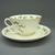 Genevive Wimsatt (American, active 2nd quarter 20th century). <em>Tea Cup and Saucer</em>, patented June 19,1928. Earthenware, Tea cup and saucer: 2 3/8 x 5 13/16 in. (6 x 14.8 cm). Brooklyn Museum, Gift of Joseph V. Garry, 1989.106.8a-b. Creative Commons-BY (Photo: Brooklyn Museum, CUR.1989.106.8a-b_view2.JPG)