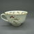 Genevive Wimsatt (American, active 2nd quarter 20th century). <em>Tea Cup and Saucer</em>, patented June 19,1928. Earthenware, Tea cup and saucer: 2 3/8 x 5 13/16 in. (6 x 14.8 cm). Brooklyn Museum, Gift of Joseph V. Garry, 1989.106.8a-b. Creative Commons-BY (Photo: Brooklyn Museum, CUR.1989.106.8a_view2.JPG)