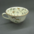 Genevive Wimsatt (American, active 2nd quarter 20th century). <em>Tea Cup and Saucer</em>, patented June 19,1928. Earthenware, Tea cup and saucer: 2 3/8 x 5 13/16 in. (6 x 14.8 cm). Brooklyn Museum, Gift of Joseph V. Garry, 1989.106.8a-b. Creative Commons-BY (Photo: Brooklyn Museum, CUR.1989.106.8a_view5.JPG)