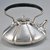 Shreve & Company (founded 1852). <em>Teapot and Lid, from a Three Piece Tea Service</em>, ca. 1910. Silver, wood, 5 1/2 x 7 1/2 x 7 in. (14 x 19.1 x 17.8 cm). Brooklyn Museum, Gift of Mr. and Mrs. Daniel L. Silberberg, by exchange, 1989.22.1a-b. Creative Commons-BY (Photo: Brooklyn Museum, CUR.1989.22.1a-b.jpg)
