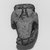  <em>Bes Amulet</em>, ca. 1836-1700 B.C.E. Faience, 1 1/4 x 13/16 x 3/8 in. (3.2 x 2.1 x 1 cm). Brooklyn Museum, Gift of Ariane, Nike, and Samara Mele, 1990.13. Creative Commons-BY (Photo: Brooklyn Museum, CUR.1990.13_negA_bw.jpg)