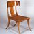 Terence Harold Robsjohn-Gibbings (British, 1905-1976, active America, 1930-1964). <em>Klismos Side Chair with Cushion</em>, 1961. Walnut, leather, fabric, Overall: 35 3/8 x 20 7/8 x 28 1/4 in. (89.9 x 53 x 71.8 cm). Brooklyn Museum, H. Randolph Lever Fund, 1991.197a-b. Creative Commons-BY (Photo: Brooklyn Museum, CUR.1991.197_view1.jpg)