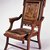 Edward W. Vaill (1861-1891). <em>Folding Armchair (reception) (Aesthetic Movement style)</em>, ca. 1880. Walnut, original upholstery, metal, 39 7/16 x 24 9/16 x 25 3/4 in. (100.2 x 62.4 x 65.4 cm). Brooklyn Museum, Bequest of DeLancey Thorn Grant in memory of her mother, Louise Floyd-Jones Thorn, by exchange, 1991.199. Creative Commons-BY (Photo: Brooklyn Museum, CUR.1991.199.jpg)