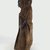 Bobo. <em>Figure of a Female</em>, early 20th century. Wood, cloth, cowrie shell, metal, 14 1/4 x 4 x 4 in. (36.2 x 10.2 x 10.2 cm). Brooklyn Museum, Gift of Eugene and Harriet Becker, 1991.226.2. Creative Commons-BY (Photo: Brooklyn Museum, CUR.1991.226.2_side_PS5.jpg)