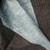 Yorùbá. <em>Prestige robe (agbádá or dàńdógó)</em>, 20th century. Cotton, silk, and indigo, 49 × 103 × 2 in. (124.5 × 261.6 × 5.1 cm). Brooklyn Museum, Gift of Dr. and Mrs. Philip Gould, 1991.230.2. Creative Commons-BY (Photo: Brooklyn Museum, CUR.1991.230.2_back.jpg)