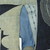 Yorùbá. <em>Prestige robe (agbádá or dàńdógó)</em>, 20th century. Cotton, silk, and indigo, 49 × 103 × 2 in. (124.5 × 261.6 × 5.1 cm). Brooklyn Museum, Gift of Dr. and Mrs. Philip Gould, 1991.230.2. Creative Commons-BY (Photo: Brooklyn Museum, CUR.1991.230.2_detail_view9.jpg)