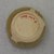 Kawai Takehiko (Japanese, born 1940). <em>Sake Cup</em>, ca. 1986. Ki-Seto ware, buff stoneware, olive-yellow glaze, 1 5/8 x 2 3/8 in. (4.1 x 6 cm). Brooklyn Museum, Gift of Dr. John P. Lyden, 1992.147.8. Creative Commons-BY (Photo: Brooklyn Museum, CUR.1992.147.8_bottom.jpg)