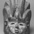 Bassa. <em>Sande society mask (gonde)</em>, 19th or 20th century. Wood, pigment, kaolin, metal, fiber, 13 x 9 x 9 in. (33.0 x 22.9 x 22.9 cm). Brooklyn Museum, Gift of Blake Robinson, 1992.26.4. Creative Commons-BY (Photo: Brooklyn Museum, CUR.1992.26.4_print_front_bw.jpg)