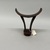 Somali. <em>Headrest</em>, 20th century. Wood, 7 1/4 x 6 1/4 x 2 1/8 in. (8.4 x 16.0 x 7.0 cm). Brooklyn Museum, Gift of The David and Margery Edwards Collection, 1992.67.10. Creative Commons-BY (Photo: Brooklyn Museum, CUR.1992.67.10_overall02.jpeg)