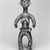 Possibly Ldamie (Dan, flourished 1920s-1930s). <em>Female Figure</em>, early 20th century. Copper alloy, rubber and glass beads, fiber, 9 1/4 x 3 9/16 x 2 3/4 in. (23.5 x 9 x 7 cm). Brooklyn Museum, Gift of Harry S. Glaze, 1992.71.3. Creative Commons-BY (Photo: Brooklyn Museum, CUR.1992.71.3_print_bw.jpg)