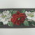 Trimz Company, Inc.. <em>'Border Paper, 'Floral-Decor (Charcoal), Pattern 2919'</em>, ca. 1950. Printed paper, height: 4 in. (10.15 cm); width: 34 1/2 in. (87.6 cm). Brooklyn Museum, Gift of Kevin L. Stayton, 1992.97.4. © artist or artist's estate (Photo: Brooklyn Museum, CUR.1992.97.4_detail.jpg)