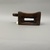 Nupe. <em>Headrest</em>, 20th century. Wood., 5 x 4 1/4 x 8 1/4in. (12.7 x 10.8 x 21cm). Brooklyn Museum, Carll H. de Silver Fund, 1993.102.1. Creative Commons-BY (Photo: Brooklyn Museum, CUR.1993.102.1_back.jpeg)