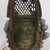Edo. <em>Pendant Mask (Uhunmwun-ekue)</em>, 19th century. Copper alloy, iron, 7 3/4 × 4 5/16 × 1 3/4 in. (19.7 × 11 × 4.5 cm). Brooklyn Museum, Gift of Dorothy Robbins, 1993.180.15. Creative Commons-BY (Photo: , CUR.1993.180.15_back.jpg)