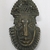 Edo. <em>Hip Ornament with Human Face (Uhunmwu-Ẹkuẹ)</em>, 18th century (possibly). Copper alloy, iron, 6 13/16 × 4 5/16 × 2 1/4 in. (17.3 × 11 × 5.7 cm). Brooklyn Museum, Gift of Beatrice Riese, 1994.143. Creative Commons-BY (Photo: , CUR.1994.143_front.jpg)