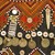  <em>Vest</em>, mid-20th century. Cotton cloth, buttons, coins, metal ornaments, beads, and seashells Brooklyn Museum, Gift of Dr. and Mrs. John P. Lyden, 1994.197.10. Creative Commons-BY (Photo: Brooklyn Museum, CUR.1994.197.10_detail1.jpg)