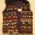  <em>Vest</em>, mid-20th century. Cotton cloth, buttons, coins, metal ornaments, beads, and seashells Brooklyn Museum, Gift of Dr. and Mrs. John P. Lyden, 1994.197.10. Creative Commons-BY (Photo: Brooklyn Museum, CUR.1994.197.10_front.jpg)