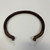  <em>Neck Ring</em>, 19th century. Copper alloy, 8 1/4 x 7 5/8 in. (21 x 19.4 cm). Brooklyn Museum, Gift of Allen C. Davis, 1995.171.9. Creative Commons-BY (Photo: Brooklyn Museum, CUR.1995.171.9_overall01.jpg)