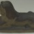 Unknown. <em>Sphinx-Shaped Doorstop</em>, 20th century. Glazed earthenware, 5 x 3 3/4 x 8 3/4 in. (12.7 x 9.5 x 22.2 cm). Brooklyn Museum, Gift of Paul F. Walter, 1999.108.11. Creative Commons-BY (Photo: Brooklyn Museum, CUR.1999.108.11_side1.jpg)