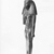  <em>A God's Wife of Amun</em>, ca. 760–656 B.C.E. Bronze, 7 5/8 x 2 1/8 x 1 3/8 in. (19.4 x 5.4 x 3.5 cm). Brooklyn Museum, Gifts in memory of Christos G. Bastis and Charles Edwin Wilbour Fund, 1999.110. Creative Commons-BY (Photo: Brooklyn Museum, CUR.1999.110_NegF_print_bw.jpg)