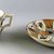 William Till (?). <em>Cup and Saucer</em>, ca. 1880. Glazed earthenware, height: 2 3/4 in. (7.0 cm). Brooklyn Museum, Gift of Paul F. Walter, 1999.29.61a-b. Creative Commons-BY (Photo: Brooklyn Museum, CUR.1999.29.61a-b.jpg)