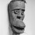 Dan. <em>Mask with Hinged Jaw (Bu Gle)</em>, 19th century. Wood, organic material, monkey skin, iron nails, 10 1/4 x 5 1/8 x 5 1/2 in.  (26.0 x 13.0 x 14.0 cm). Brooklyn Museum, Gift of Blake Robinson, 2000.38.2. Creative Commons-BY (Photo: Brooklyn Museum, CUR.2000.38.2_print_bw_threequarter_bw.jpg)