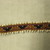 Quechua. <em>Woven Tie (Wato)</em>, 2002. Alpaca fleece, sheep wool, glass(?) beads, natural dyes, 1/2 × 44 1/4 in. (1.3 × 112.4 cm). Brooklyn Museum, Frank Sherman Benson Fund, 2002.62.3. Creative Commons-BY (Photo: Brooklyn Museum, CUR.2002.62.3_view02.jpg)