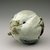  <em>Water Dropper in the Shape of a Peach</em>, last half of 18th century. White porcelain with underglaze iron-brown (on the stem), copper red (on the tip), and cobalt-blue (on the leaves), 3 15/16 in. (10 cm). Brooklyn Museum, The Peggy N. and Roger G. Gerry Collection, 2004.28.131. Creative Commons-BY (Photo: Brooklyn Museum (in collaboration with National Research Institute of Cultural Heritage, , CUR.2004.28.131_top_Heon-Kang_photo_NRICH.jpg)