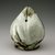  <em>Water Dropper in the Shape of a Peach</em>, last half of 18th century. White porcelain with underglaze iron-brown (on the stem), copper red (on the tip), and cobalt-blue (on the leaves), 3 15/16 in. (10 cm). Brooklyn Museum, The Peggy N. and Roger G. Gerry Collection, 2004.28.131. Creative Commons-BY (Photo: Brooklyn Museum (in collaboration with National Research Institute of Cultural Heritage, , CUR.2004.28.131_view2_Heon-Kang_photo_NRICH.jpg)