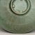  <em>Bowl</em>, last half 12th century. Stoneware with celadon glaze, Height: 1 5/16 in. (3.3 cm). Brooklyn Museum, The Peggy N. and Roger G. Gerry Collection, 2004.28.243. Creative Commons-BY (Photo: Brooklyn Museum (in collaboration with National Research Institute of Cultural Heritage, , CUR.2004.28.243_base_detail_Heon-Kang_photo_NRICH.jpg)