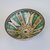  <em>Bowl with Twelve-Pointed Central Star</em>, 19th century. Earthenware with green, yellow, blue, brown and white glazes, Diam: 11 3/4 in. (29.8 cm); H. 5 in. Brooklyn Museum, Gift of Dr. Charles S. Grippi in honor of the memory of the late Professor Virgil H. Bird, 2004.83.2. Creative Commons-BY (Photo: Brooklyn Museum, CUR.2004.83.2_interior.jpg)