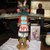 probably Henry Shelton (1929-2016). <em>Kachina Doll (Kwahu [Eagle])</em>, 1960-1970. Cottonwood root, acrylic pigment, feathers, yarn, leather, 19 1/2 x 27 x 5 in. (49.5 x 68.6 x 12.7 cm). Brooklyn Museum, Gift of Edith and Hershel Samuels, 2010.6.13. Creative Commons-BY (Photo: Brooklyn Museum, CUR.2010.6.13_back.jpg)