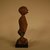 Dogon. <em>Figure</em>, early 20th century. Wood, organic materials, 6 11/16 x 1 15/16 x 1 15/16 in. (17 x 5 x 5 cm). Brooklyn Museum, Gift in memory of Frederic Zeller, 2014.54.16 (Photo: Brooklyn Museum, CUR.2014.54.16_side1.jpg)