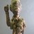 Kongo. <em>Power Figure (Nkisi)</em>, 20th century. Wood, fiber, resin, cloth, glass, 10 1/4 x 3 9/16 x 3 9/16 in. (26 x 9 x 9 cm). Brooklyn Museum, Gift in memory of Frederic Zeller, 2014.54.26 (Photo: Brooklyn Museum, CUR.2014.54.26_detail.jpg)