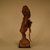 Kongo. <em>Power Figure (Nkisi)</em>, 20th century. Wood, fiber, resin, cloth, glass, 10 1/4 x 3 9/16 x 3 9/16 in. (26 x 9 x 9 cm). Brooklyn Museum, Gift in memory of Frederic Zeller, 2014.54.26 (Photo: Brooklyn Museum, CUR.2014.54.26_side2.jpg)