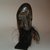 Dan. <em>Miniature Mask</em>, 20th century. Wood, fiber, fur, 7 1/16 x 2 9/16 x 2 3/8 in. (18 x 6.5 x 6 cm). Brooklyn Museum, Gift in memory of Frederic Zeller, 2014.54.28 (Photo: Brooklyn Museum, CUR.2014.54.28_side2.jpg)