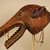 Senufo. <em>Mask (Korobla)</em>, 20th century. Wood, pigment, hide, fiber, metal, 6 11/16 x 7 7/8 x 13 3/4 in. (17 x 20 x 35 cm). Brooklyn Museum, Gift in memory of Frederic Zeller, 2014.54.42 (Photo: Brooklyn Museum, CUR.2014.54.42_side1.jpg)